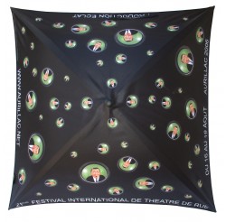 Advertising umbrella for "le festival international du théatre de rue d'Aurillac"